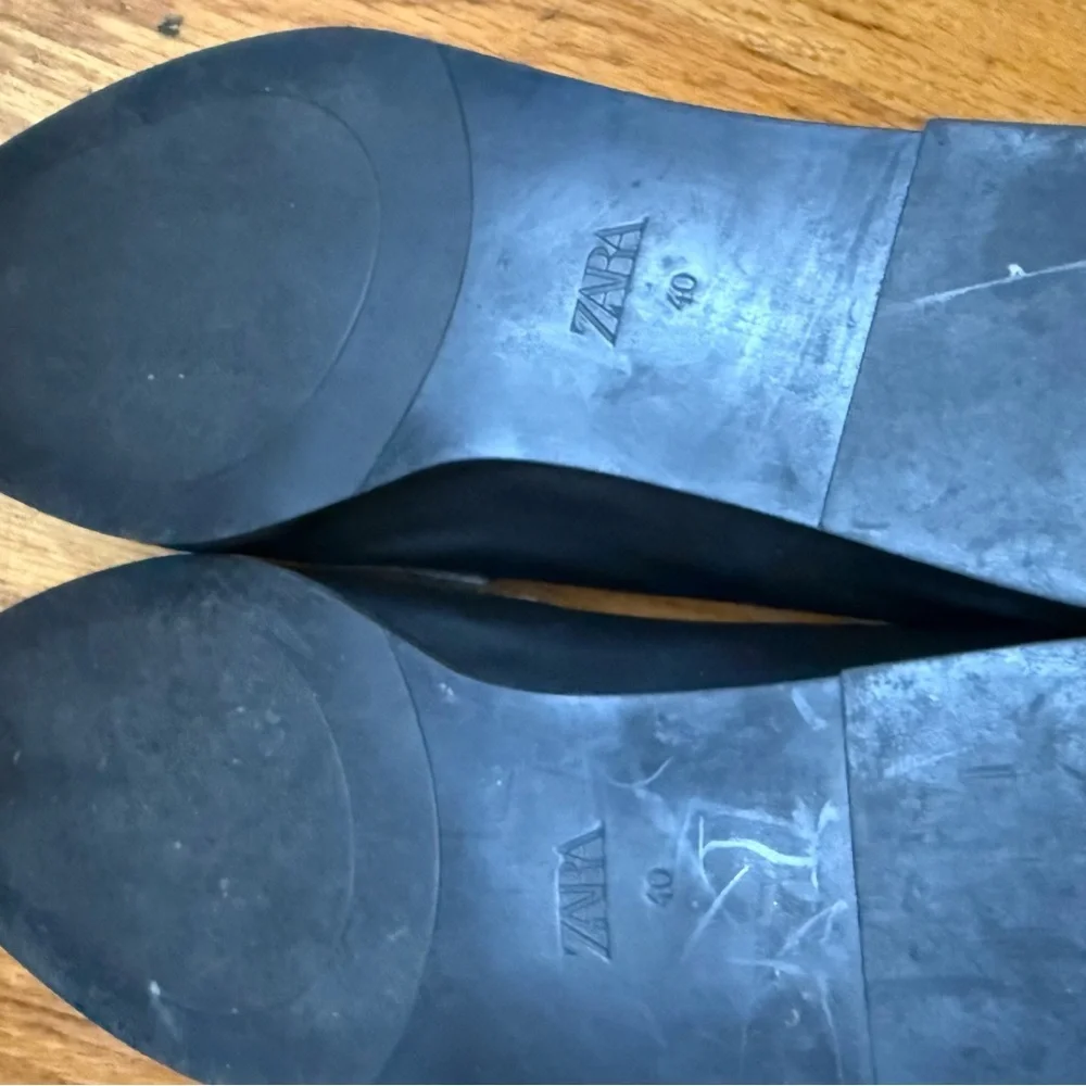 Zara Black Leather Slip on Loafers with Gold Horsebit Buckle Trim.